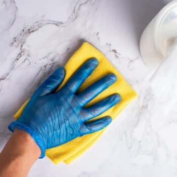 Man Cleaning a Counter Top